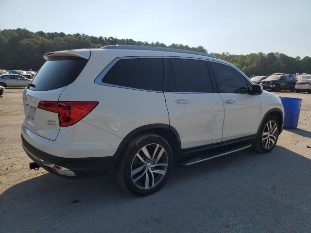 Photo 3 from auction – 2018 HONDA PILOT ELIT with VIN 5FNYF6H03JB019850
