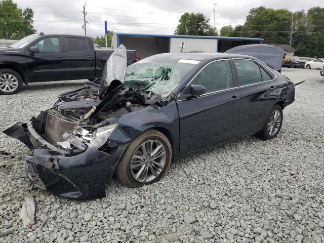 TOYOTA CAMRY LE 2017 with VIN 4T1BF1FK4HU384175 - Photo from auction