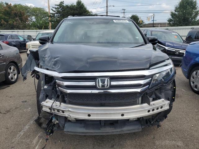 Photo 5 from auction – 2017 HONDA PILOT ELIT with VIN 5FNYF6H04HB104643