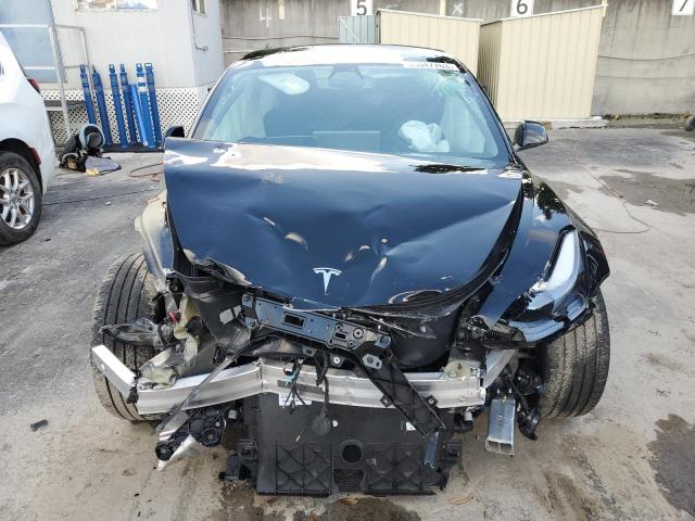 Photo 5 from auction – 2022 TESLA MODEL 3 with VIN 5YJ3E1EB2NF288742