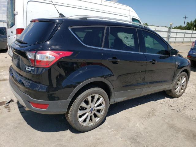 Photo 3 from auction – 2018 FORD ESCAPE TIT with VIN 1FMCU9J98JUC89413