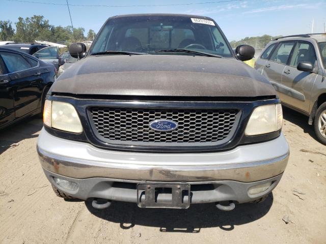 Photo 5 from auction – 2000 FORD F150 with VIN 1FTRX18L0YKA20529