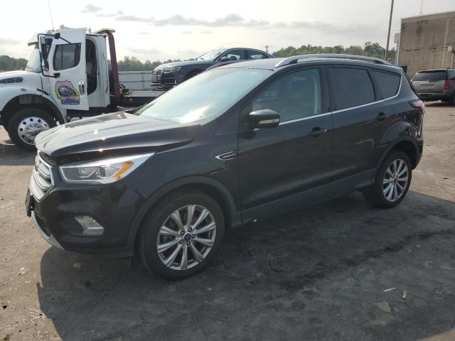 FORD ESCAPE TIT 2017 with VIN 1FMCU9J96HUC05972 - Photo from auction