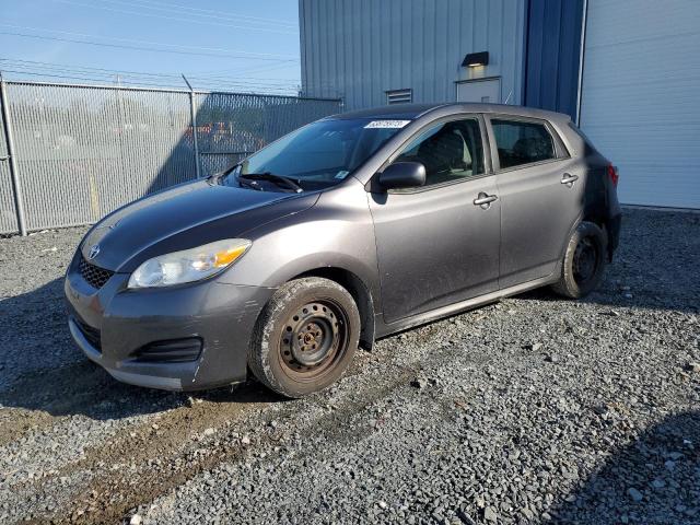 TOYOTA COROLLA MA 2009 with VIN 2T1KE40EX9C014360 - Photo from auction