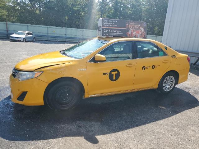 TOYOTA CAMRY HYBR 2014 with VIN 4T1BD1FK3EU112010 - Photo from auction