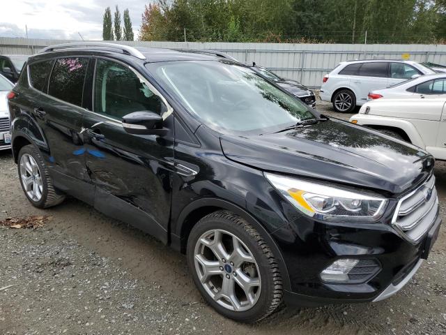 Photo 4 from auction – 2017 FORD ESCAPE TIT with VIN 1FMCU9J90HUD43149
