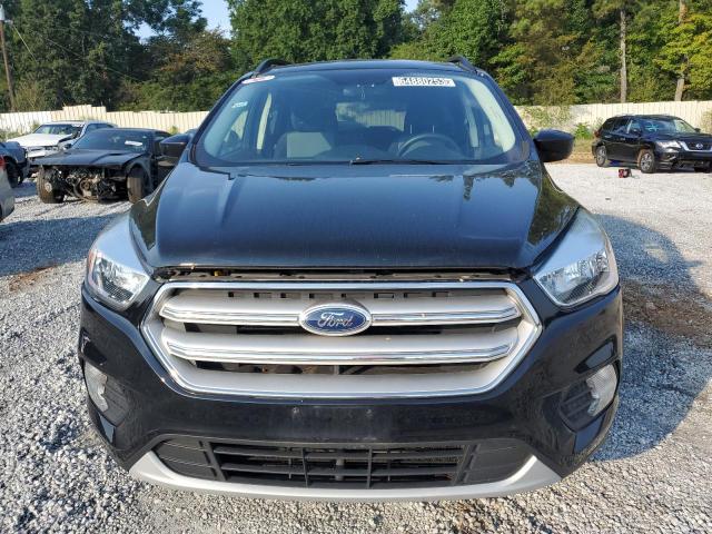 Photo 5 from auction – 2018 FORD ESCAPE SE with VIN 1FMCU0GD6JUC32554