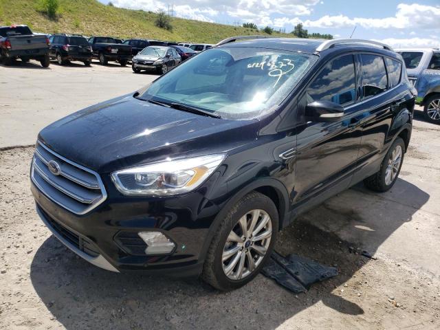 FORD ESCAPE TIT 2018 with VIN 1FMCU9J98JUC89413 - Photo from auction