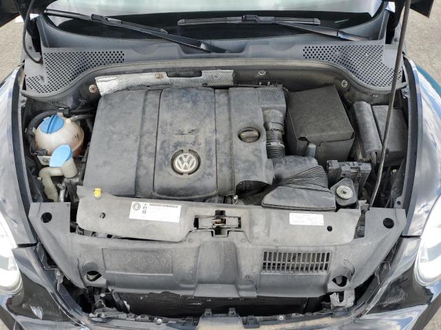 Photo 11 from auction – 2014 VOLKSWAGEN BEETLE with VIN 3VWFP7ATXEM620623