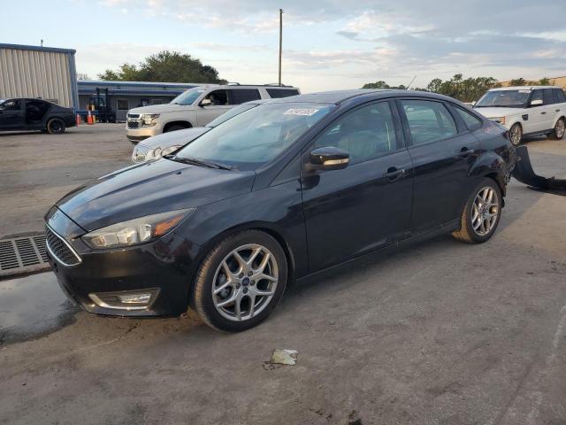 FORD FOCUS SE 2015 with VIN 1FADP3F29FL218832 - Photo from auction