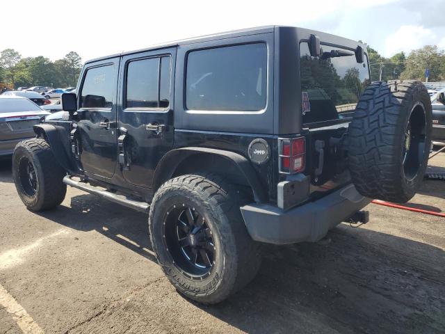 Photo 2 from auction – 2011 JEEP WRANGLER U with VIN 1J4BA6H16BL574068