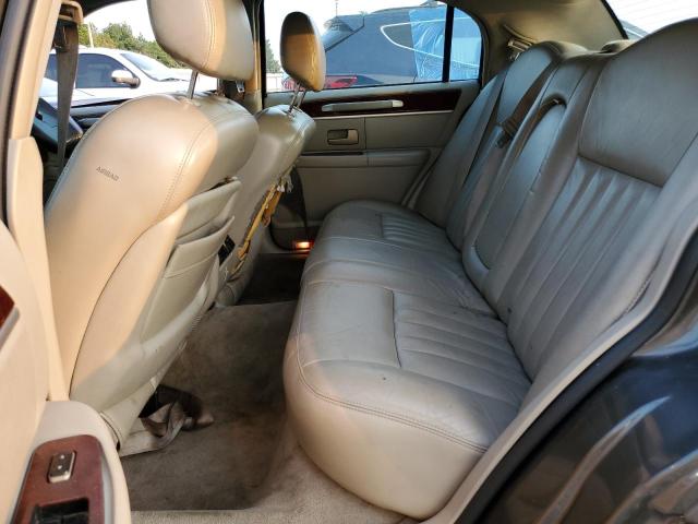 Photo 10 from auction – 2004 LINCOLN TOWN CAR E with VIN 1LNHM81W54Y656173