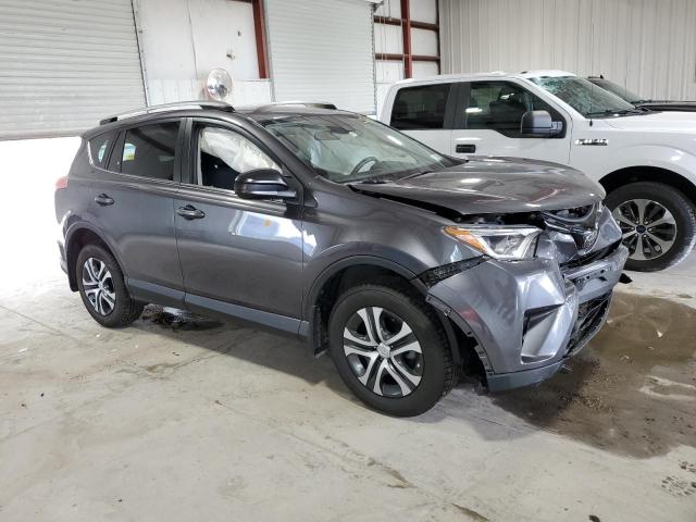 Photo 4 from auction – 2018 TOYOTA RAV4 LE with VIN JTMBFREV9JJ213119