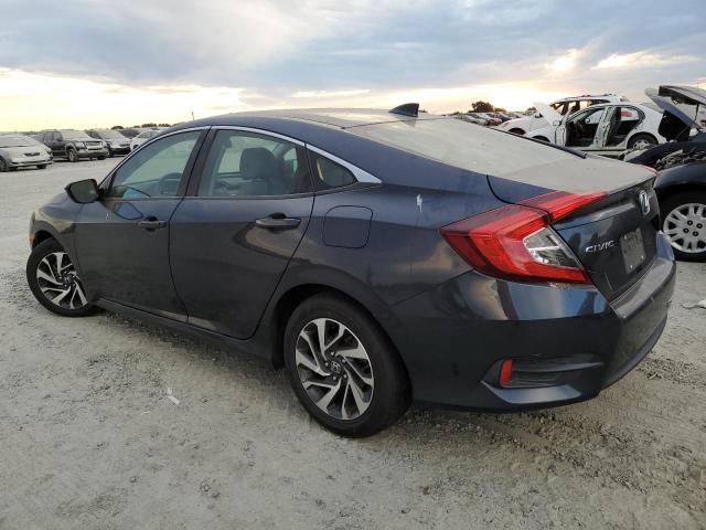 Photo 2 from auction – 2018 HONDA CIVIC EX with VIN 2HGFC2F76JH525354