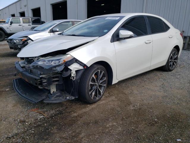 TOYOTA COROLLA L 2019 with VIN 5YFBURHE4KP879562 - Photo from auction