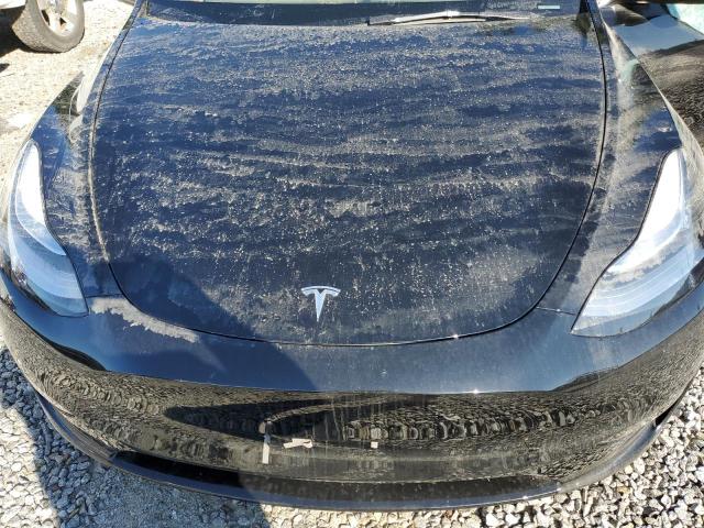 Photo 12 from auction – 2023 TESLA MODEL Y with VIN 7SAYGDEE8PA138763
