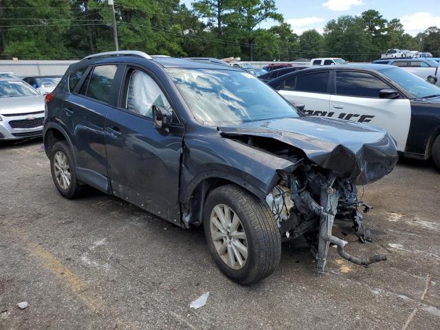 Photo 4 from auction – 2014 MAZDA CX-5 SPORT with VIN JM3KE2BE9E0379299