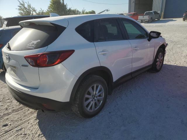 Photo 3 from auction – 2014 MAZDA CX-5 TOURI with VIN JM3KE2CY7E0416696