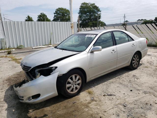 TOYOTA CAMRY LE 2004 with VIN 4T1BE30K24U804498 - Photo from auction