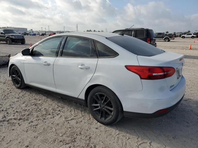Photo 2 from auction – 2015 FORD FOCUS SE with VIN 1FADP3F29FL210357