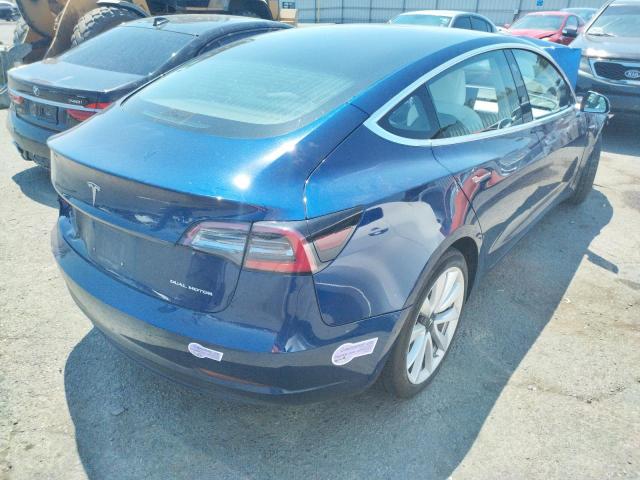 Снимка 3 от търг – 2018 TESLA MODEL 3 с VIN 5YJ3E1EB1JF101047