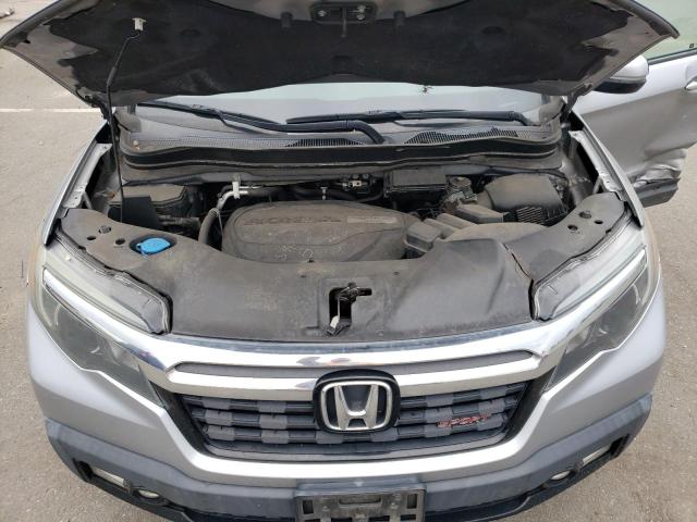 Photo 11 from auction – 2018 HONDA RIDGELINE with VIN 5FPYK3F12JB004124