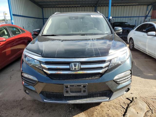 Photo 5 from auction – 2017 HONDA PILOT ELIT with VIN 5FNYF6H06HB014104