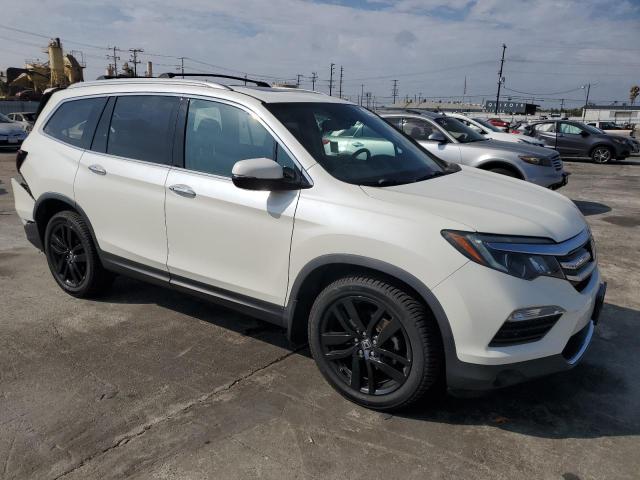 Photo 4 from auction – 2017 HONDA PILOT ELIT with VIN 5FNYF6H08HB057486