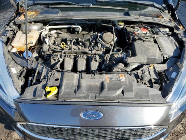 Photo 11 from auction – 2015 FORD FOCUS SE with VIN 1FADP3F25FL293284