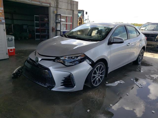 TOYOTA COROLLA L 2017 with VIN 5YFBURHE3HP615404 - Photo from auction