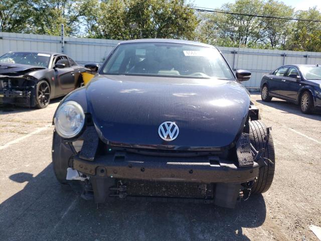 Photo 5 from auction – 2013 VOLKSWAGEN BEETLE TUR with VIN 3VWVA7AT2DM621924