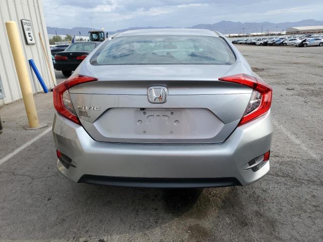 Photo 6 from auction – 2018 HONDA CIVIC LX with VIN 19XFC2F59JE043003