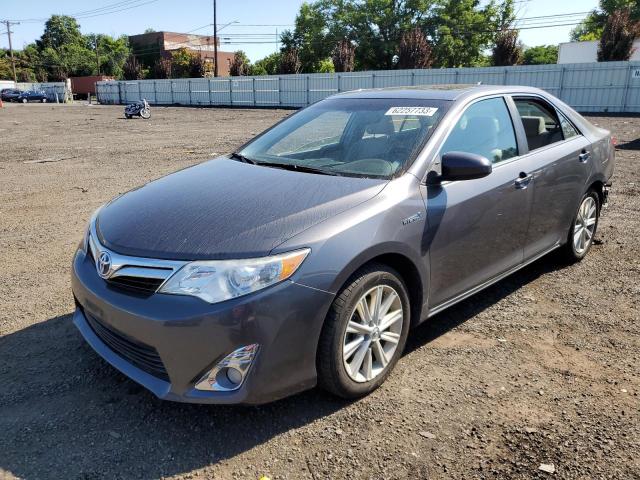 TOYOTA CAMRY HYBR 2014 with VIN 4T1BD1FK3EU117014 - Photo from auction