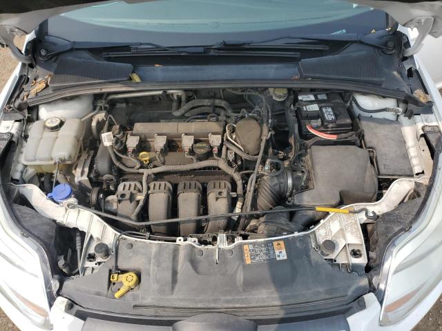 Photo 11 from auction – 2014 FORD FOCUS S with VIN 1FADP3E27EL306763