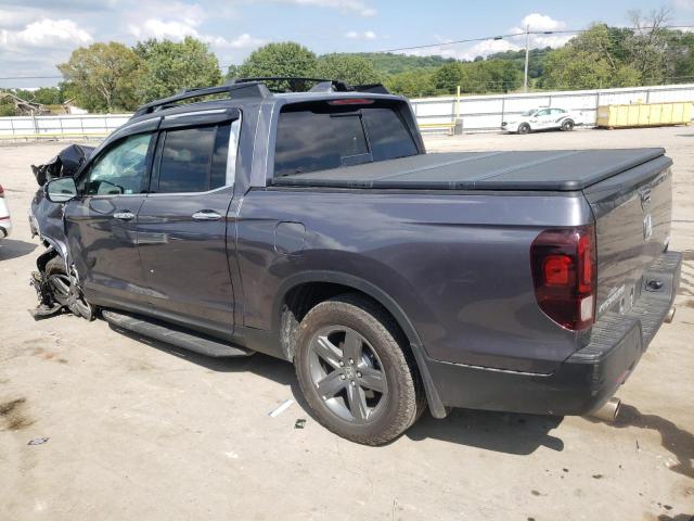 Photo 2 from auction – 2022 HONDA RIDGELINE with VIN 5FPYK3F74NB021873