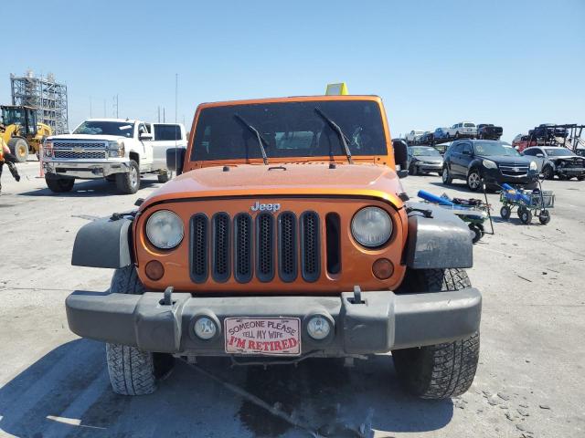 Photo 5 from auction – 2011 JEEP WRANGLER U with VIN 1J4BA6H17BL582793