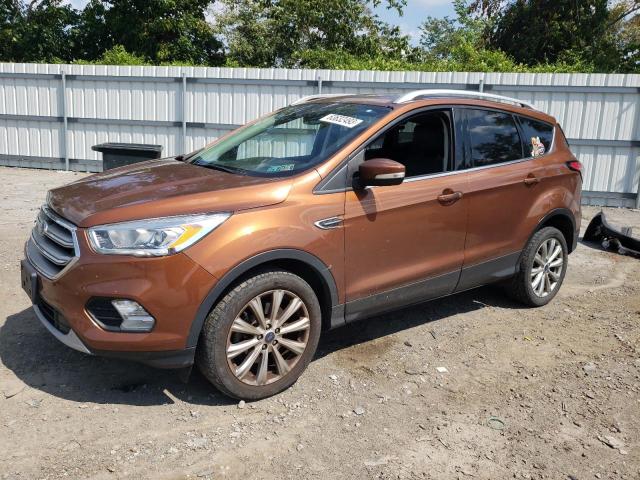 FORD ESCAPE TIT 2017 with VIN 1FMCU9J9XHUE32484 - Photo from auction