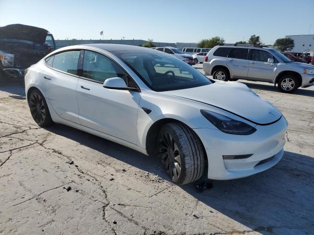 Снимка 4 от търг – 2022 TESLA MODEL 3 с VIN 5YJ3E1EC5NF299131