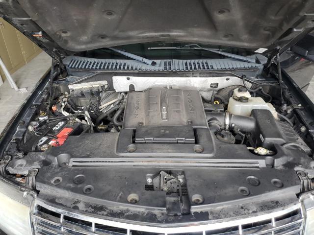 Photo 12 from auction – 2014 LINCOLN NAVIGATOR with VIN 5LMJJ3H53EEL05773
