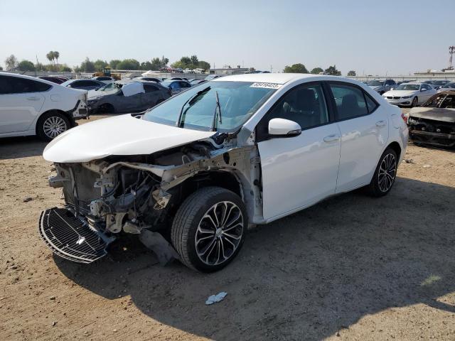 TOYOTA COROLLA L 2014 with VIN 5YFBURHE6EP058693 - Photo from auction