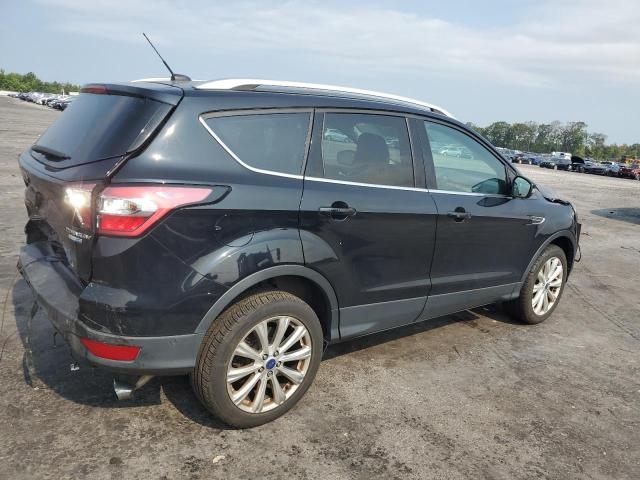 Photo 3 from auction – 2017 FORD ESCAPE TIT with VIN 1FMCU9J96HUC05972
