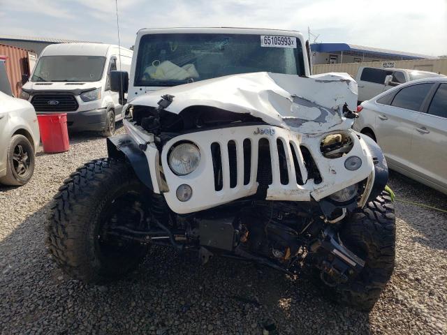 Photo 5 from auction – 2014 JEEP WRANGLER U with VIN 1C4BJWDG3EL145765