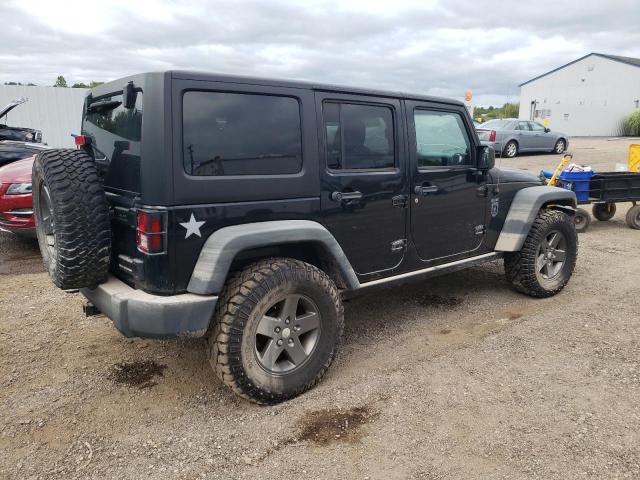 Photo 3 from auction – 2011 JEEP WRANGLER U with VIN 1J4HA6H15BL564707