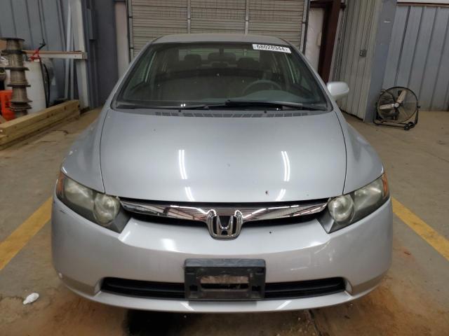 Photo 5 from auction – 2006 HONDA CIVIC LX with VIN 1HGFA16596L080911