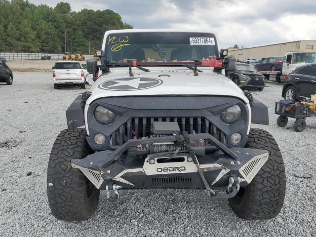 Photo 5 from auction – 2016 JEEP WRANGLER U with VIN 1C4BJWDG0GL212888