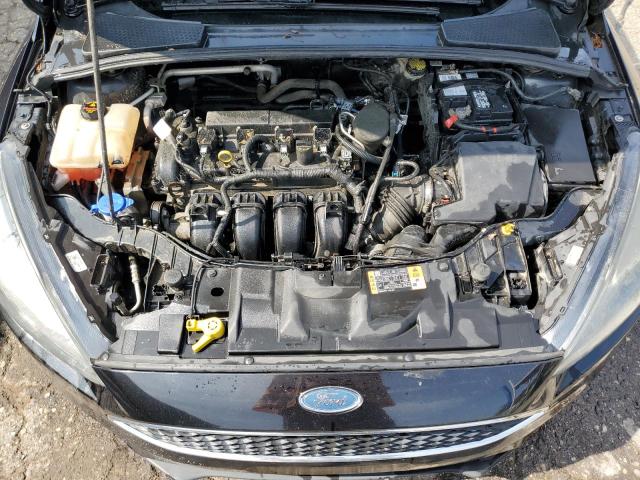 Photo 11 from auction – 2015 FORD FOCUS SE with VIN 1FADP3K21FL319496