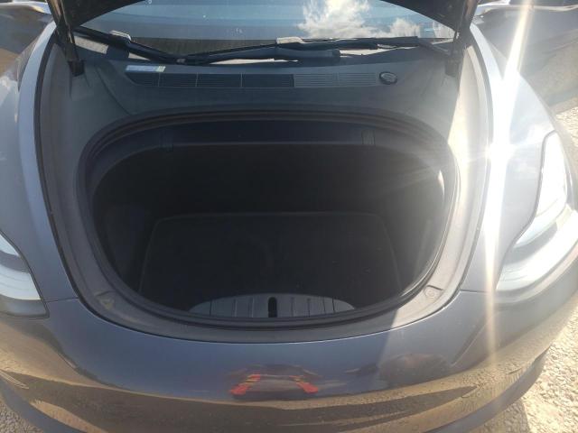 Photo 11 from auction – 2018 TESLA MODEL 3 with VIN 5YJ3E1EA7JF047096