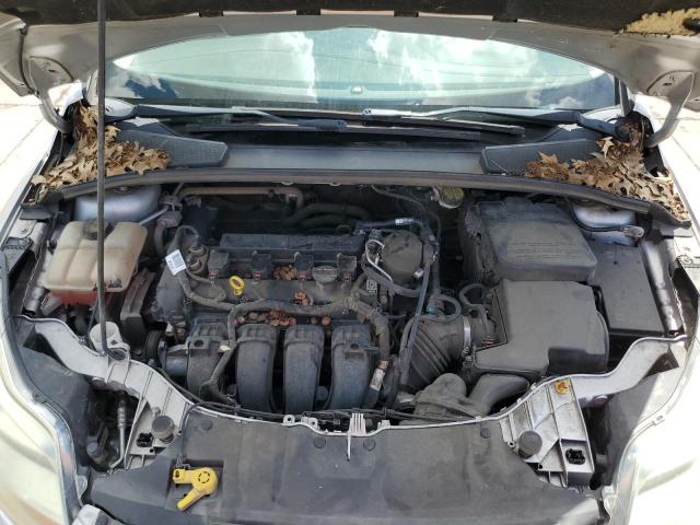 Photo 11 from auction – 2014 FORD FOCUS S with VIN 1FADP3E21EL320903