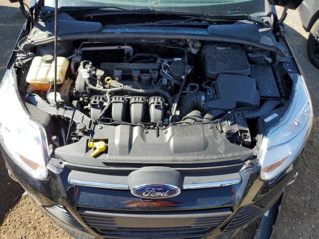 Photo 11 from auction – 2014 FORD FOCUS SE with VIN 1FADP3F27EL236647