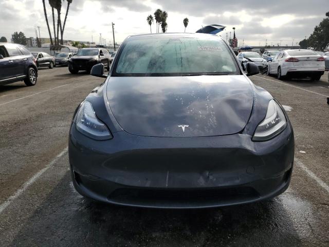 Photo 5 from auction – 2023 TESLA MODEL Y with VIN 7SAYGDEE6PA030576